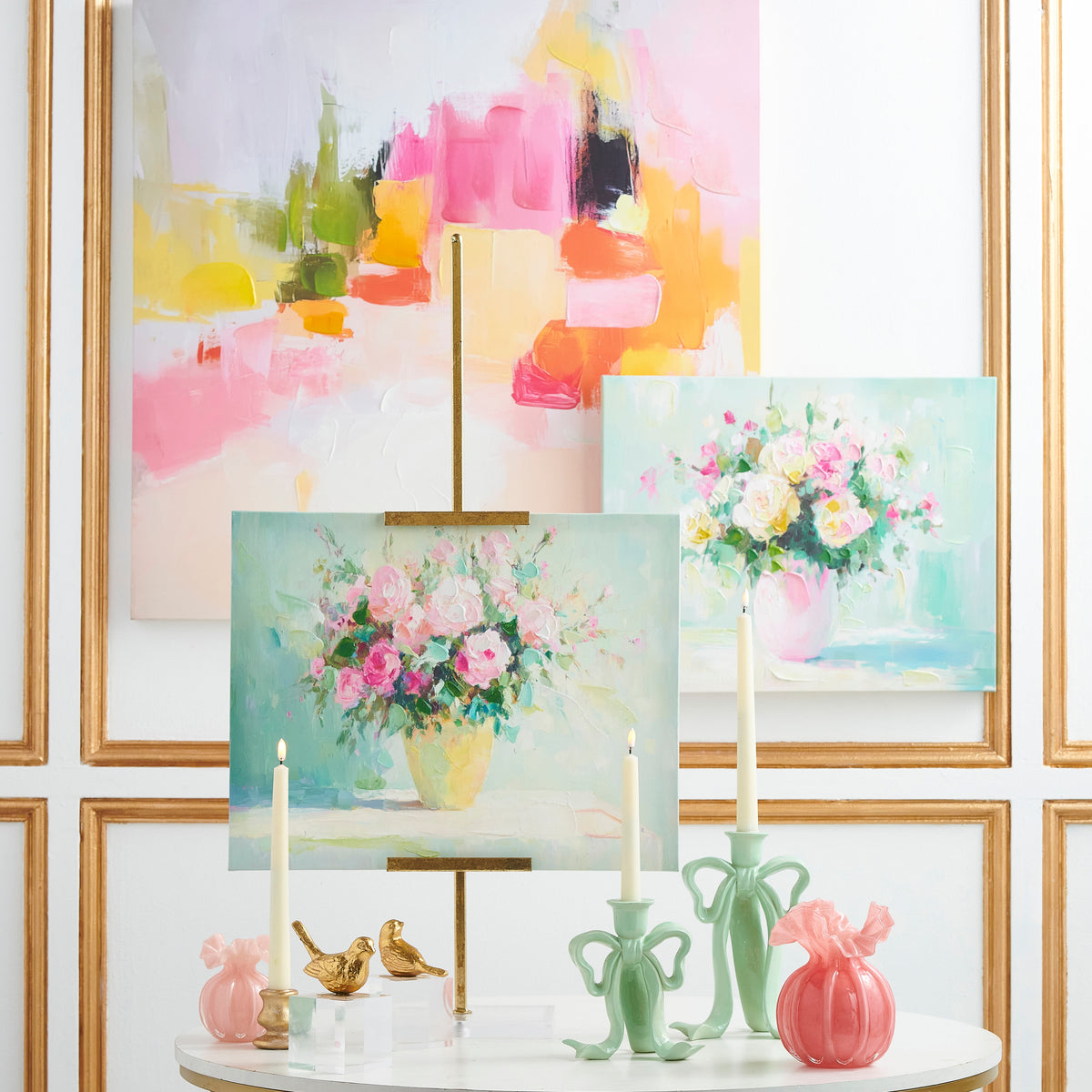 36-inch gold metal easel with clear acrylic back panel holding a framed item