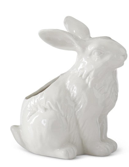 White porcelain rabbit-shaped container with smooth rounded ears.