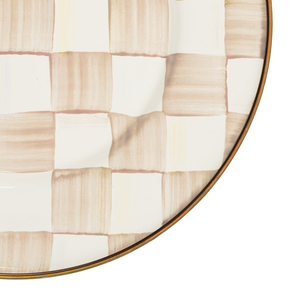 Close-up of a Mocha Check Salad Plate with hand-painted tan checks and a bronzed stainless steel rim.