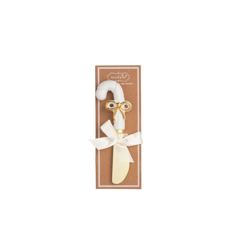 Gold detail Christmas spreader with a white candy cane stoneware handle and cream satin ribbon.