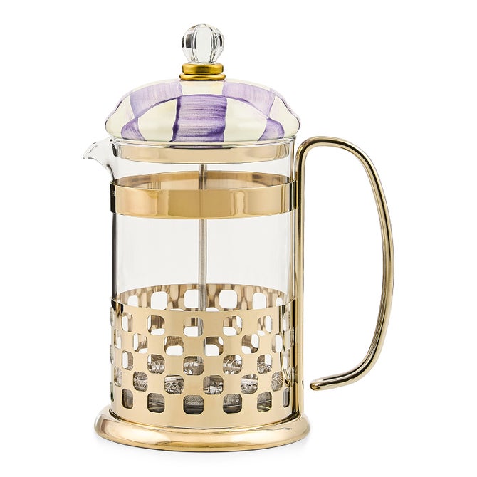 Violet check French press coffee maker with a cylindrical glass body.