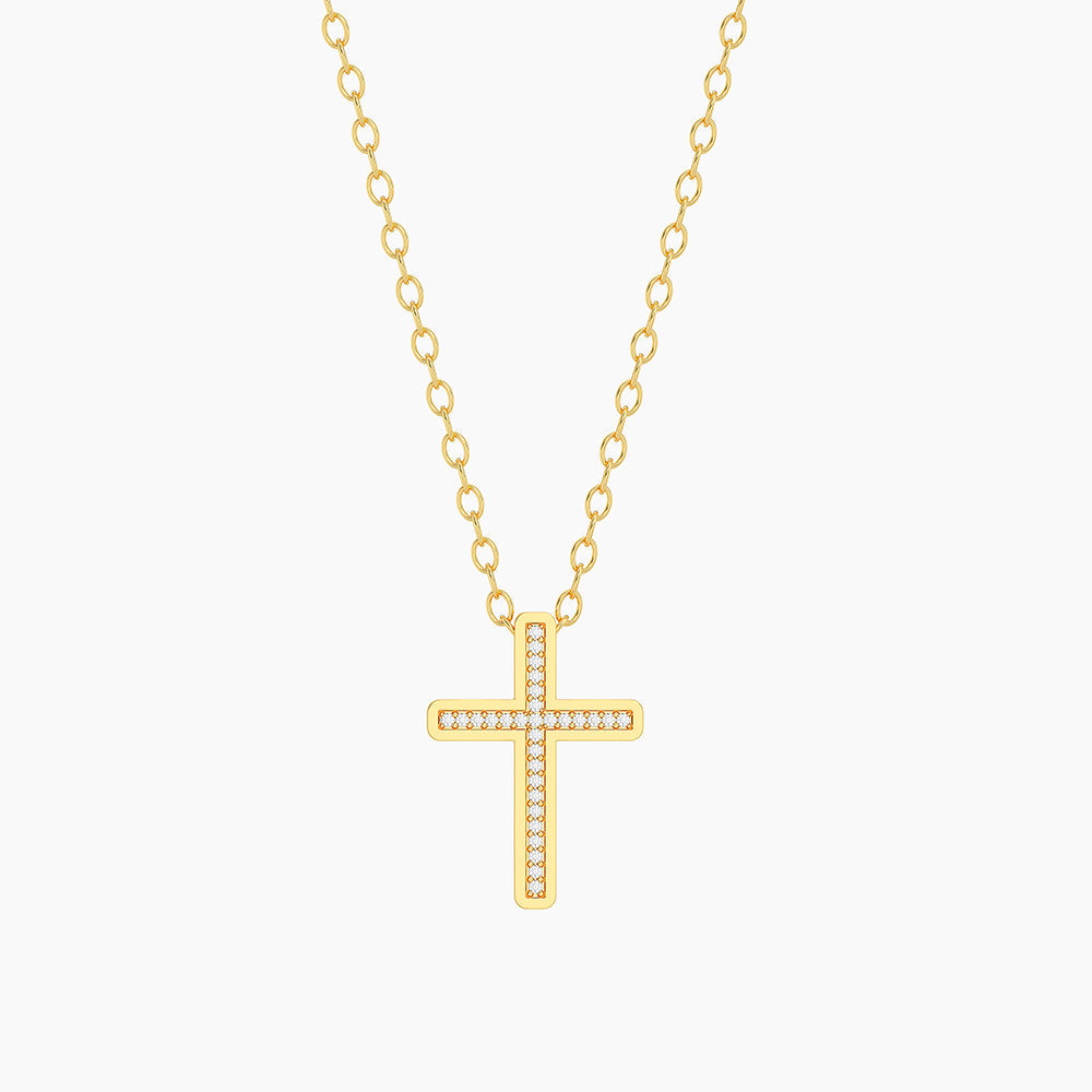 Gold plated cross pendant necklace with natural diamond accents on a delicate link chain.