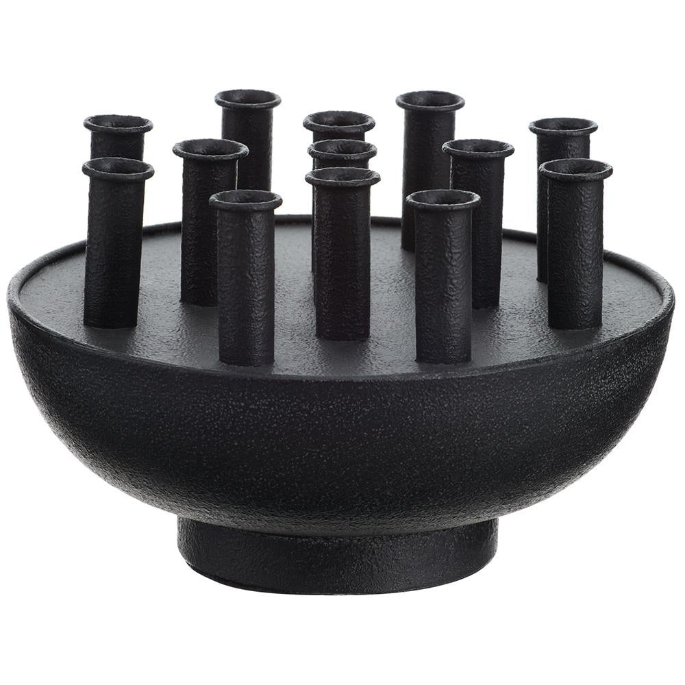 Large matte black metal tulip vase with a smooth curved silhouette.
