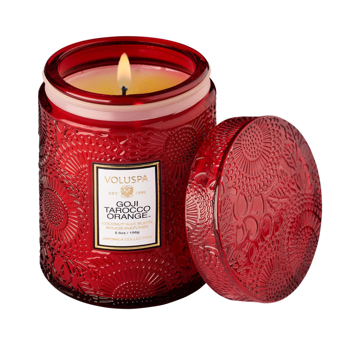 Small jar candle with Goji Tarocco orange wax and a natural wick.
