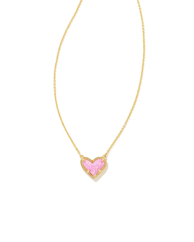 Ari Heart Short Pendant Necklace featuring an asymmetrical heart-shaped pendant on a silver chain.