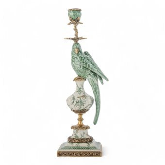 Porcelain green parrot candle holder with bronze ormolu accents on a decorative pedestal base.
