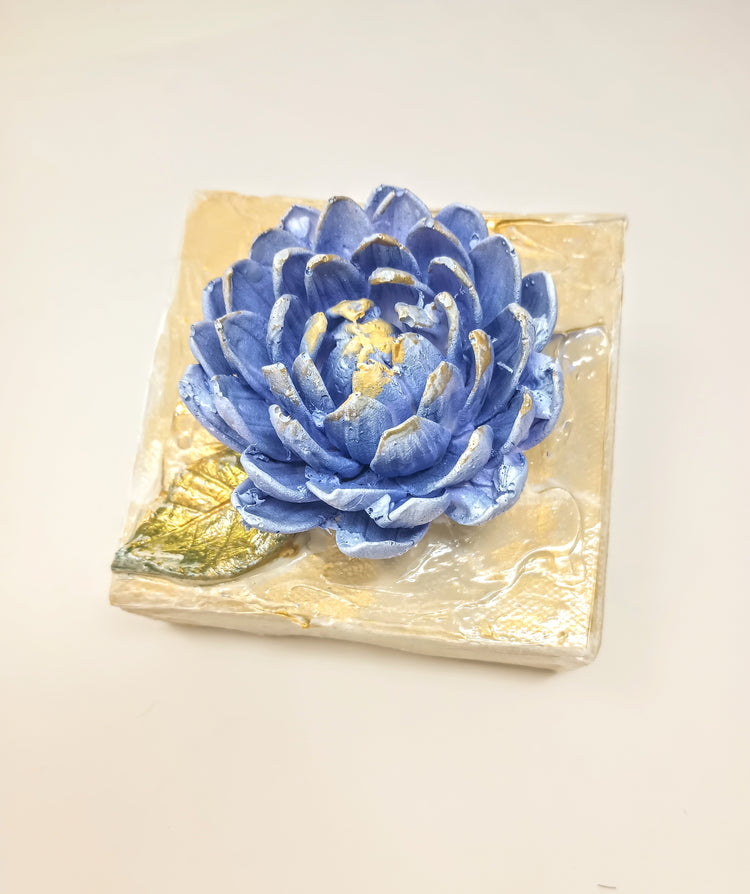 4x4 inch square clay artwork featuring a mum flower with textured petals in earthy tones.