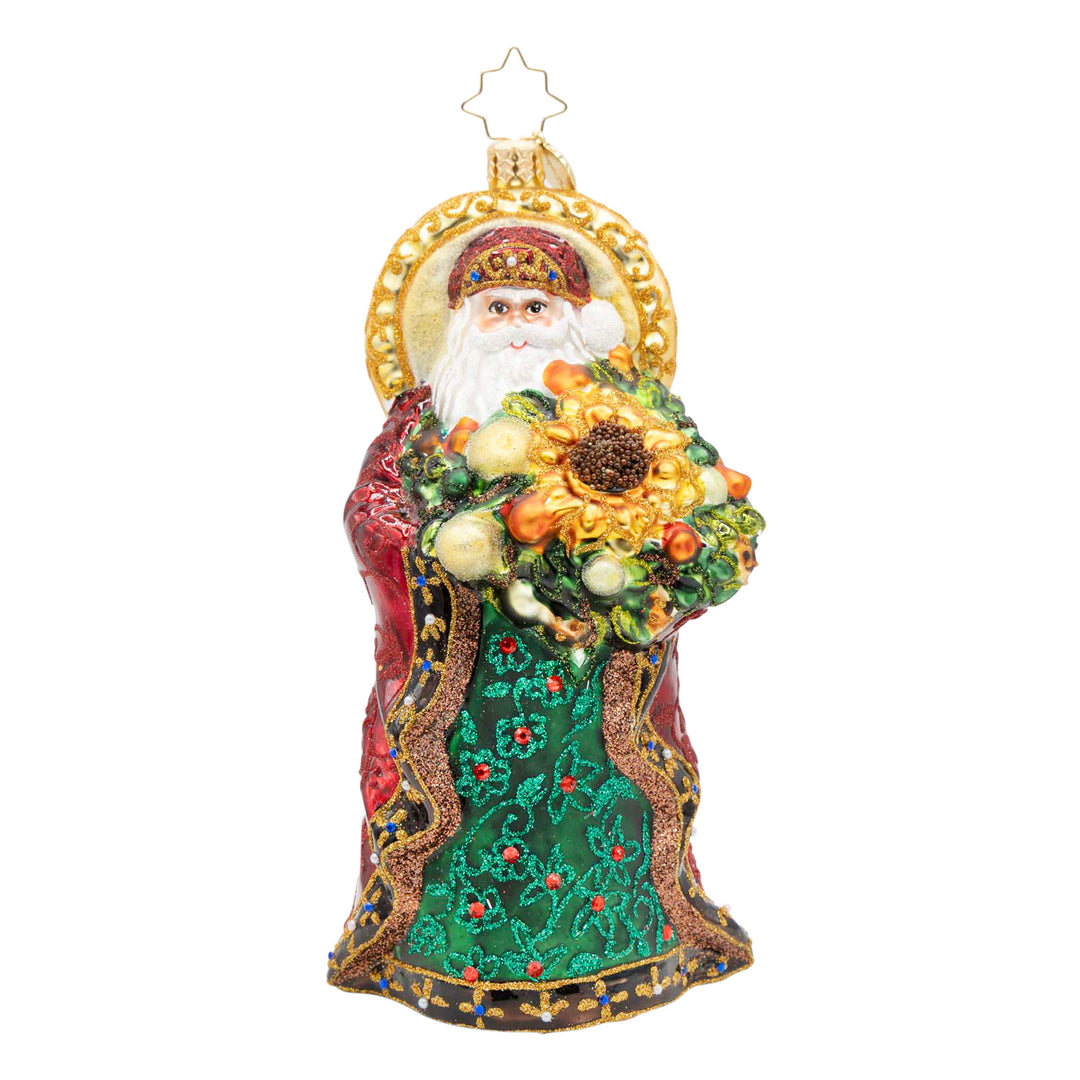 Regal Radiance Santa ornament in green and red robes holding a large sunflower bouquet.