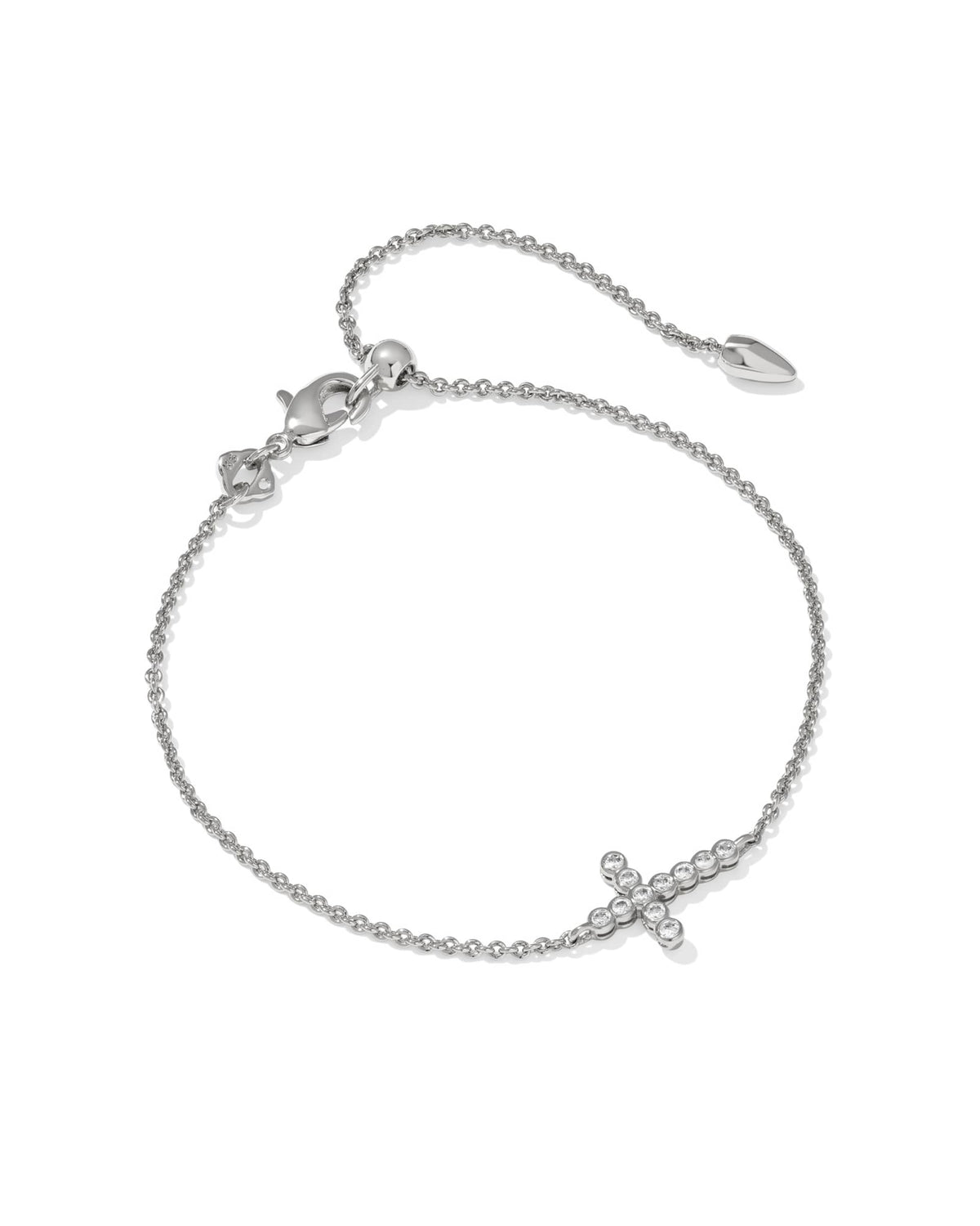 Delicate rhodium chain bracelet with white cubic zirconia cross pendant