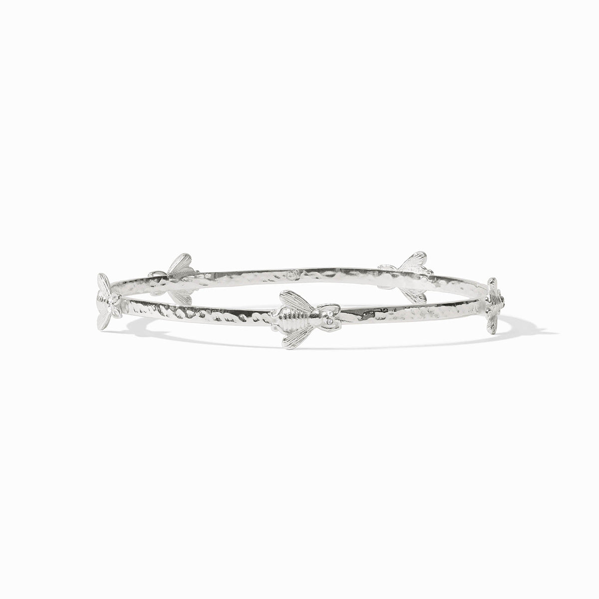 Silver-plated bangle bracelet with cubic zirconia accents in a sleek circular silhouette.