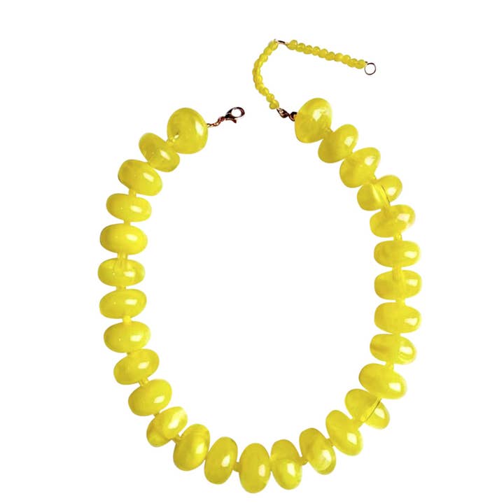 Bailey Chunky Beaded Necklace featuring large, glossy yellow marbled beads on a white background.