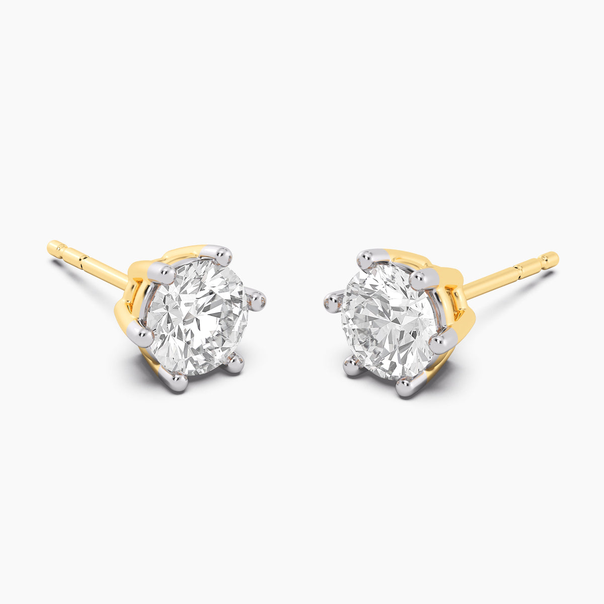 Lab-grown diamond stud earrings in gold with a six-prong setting