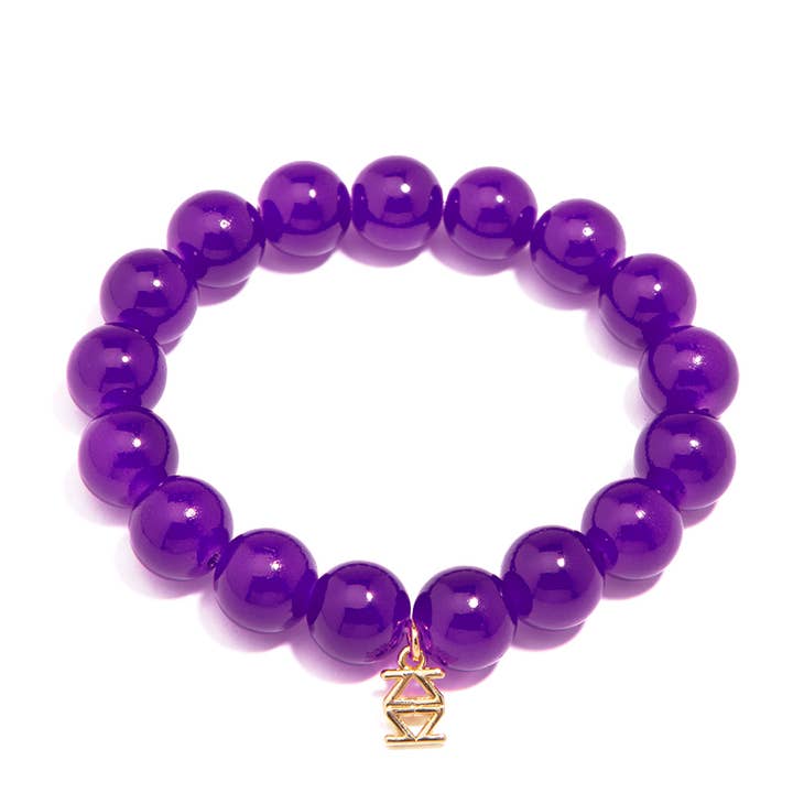 Stretch bracelet with glossy lucite glass beads in a neutral tone.