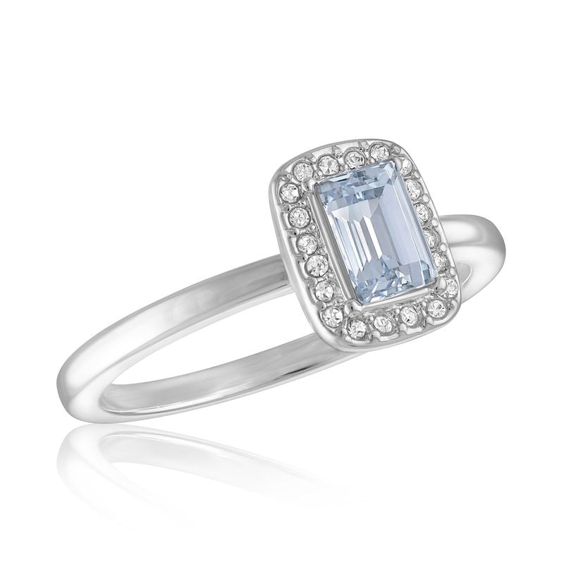 CZ Emerald Cut Stack Ring with a light blue center stone and a halo of clear cubic zirconia.