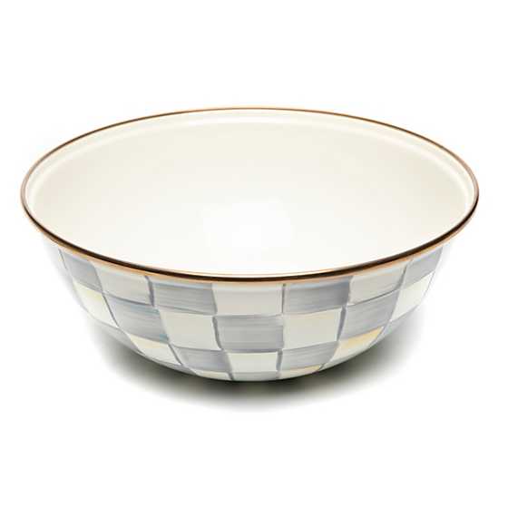 Hand-glazed steel everyday bowl with grey checkered enamel pattern over bronzed stainless steel rim.