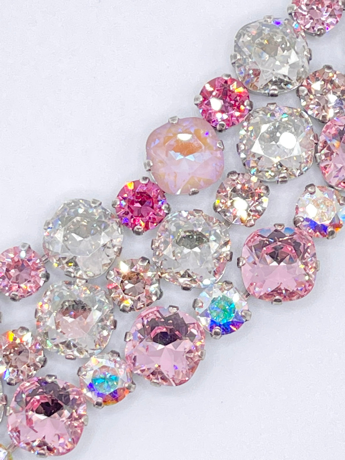 Close-up of the Osaka Premier Bracelet featuring pink, clear, and iridescent round crystals.