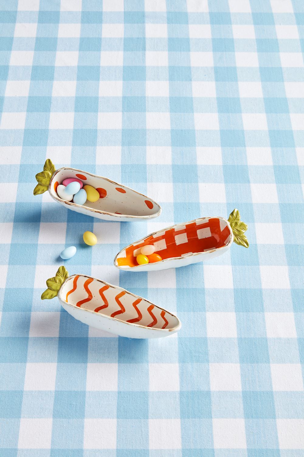 Carrot Candy Dish with a vibrant orange glazed ceramic finish.
