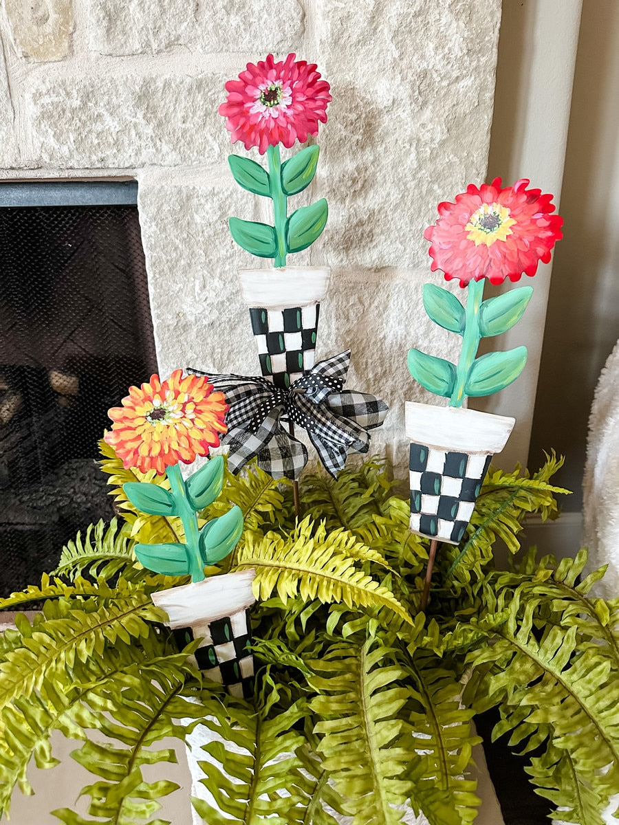 Elegant Zinnia pot in white ceramic with a zinnia flower silhouette and stake/hang/easel function.