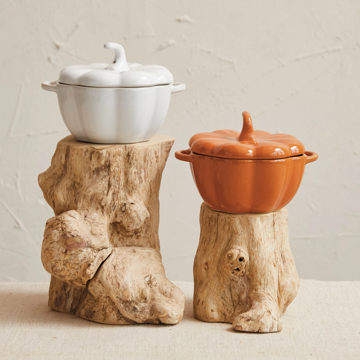 Stoneware pumpkin-shaped baker with handles in orange