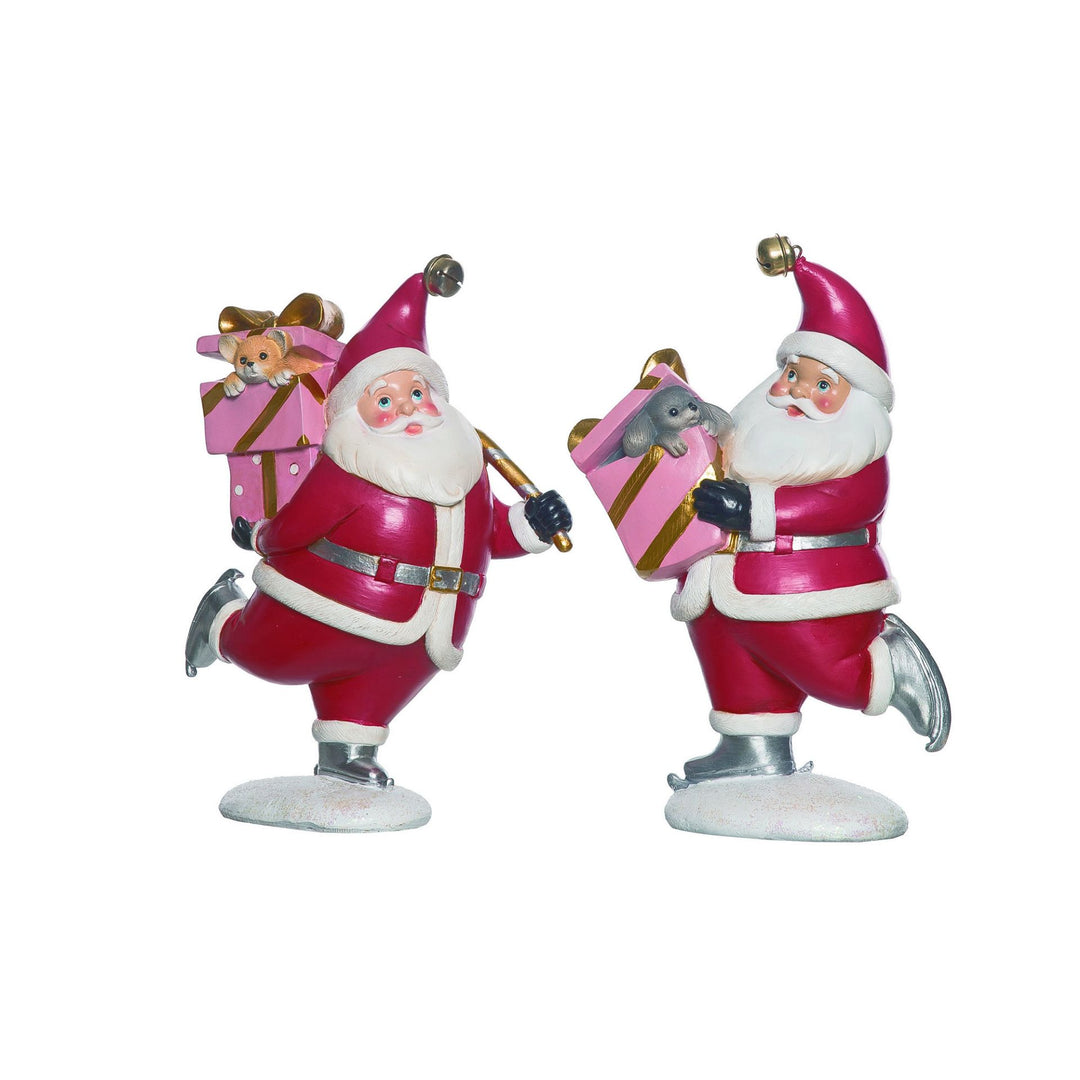 Resin Santa figure on skates with a red suit, white beard, black boots, and green hat.