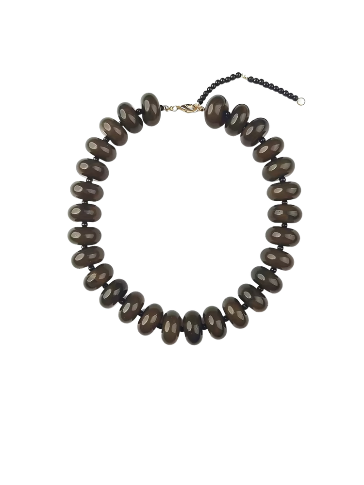 Bright Acrylic Gradient Necklace featuring large, smooth dark brown oval beads on a gold clasp.