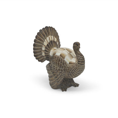 Mocha check mini turkey figurine with brown spotted feathers on a cream background.