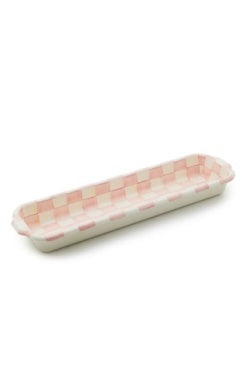 Long, narrow ceramic baguette dish with a pink and white checkered pattern and small side handles.