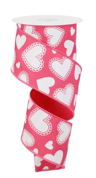 Hot pink polyester scallop hearts fabric with a wavy edge pattern.
