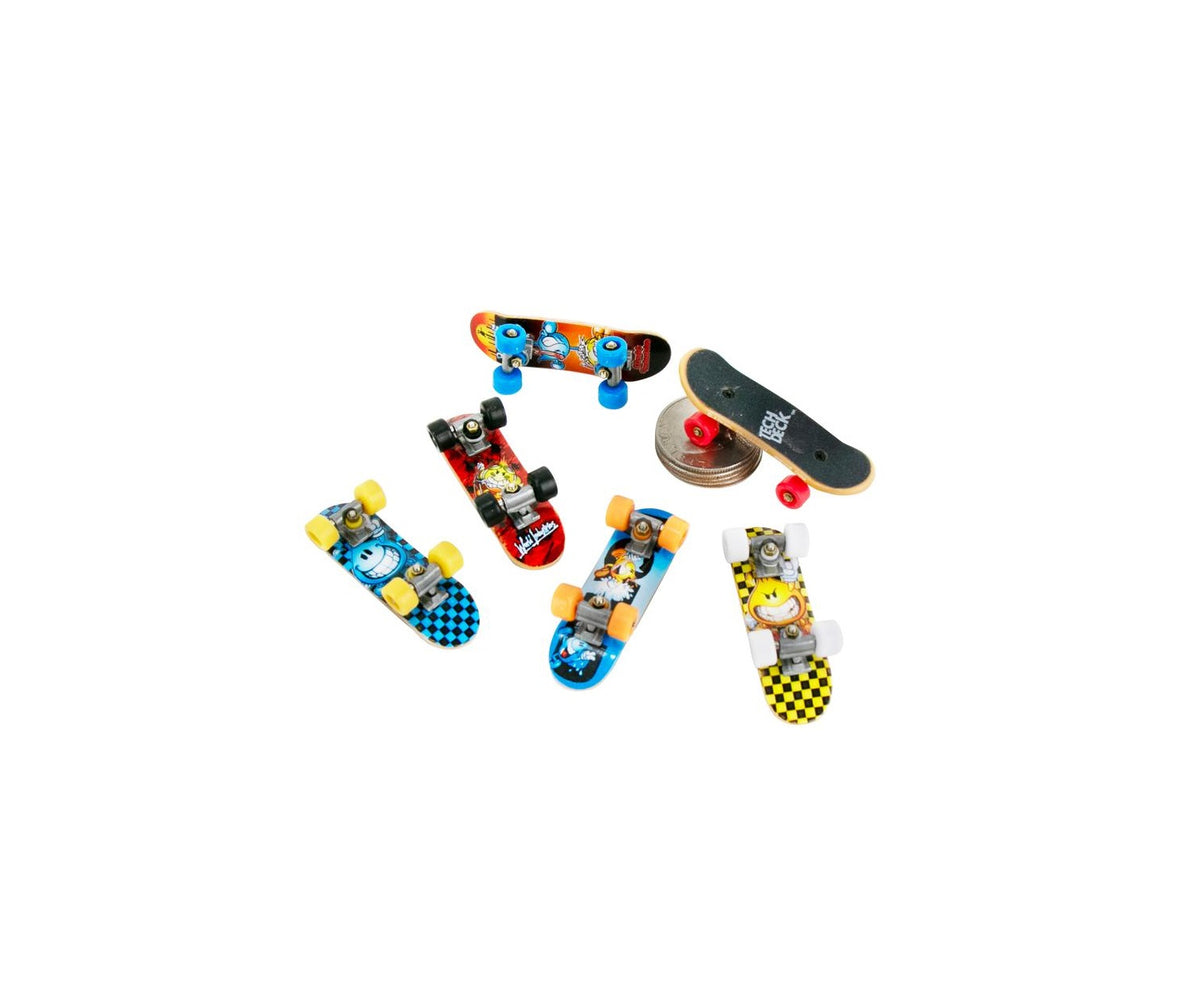 Six assorted World’s Smallest Tech Deck Series 2 fingerboards shown next to a stack of coins.