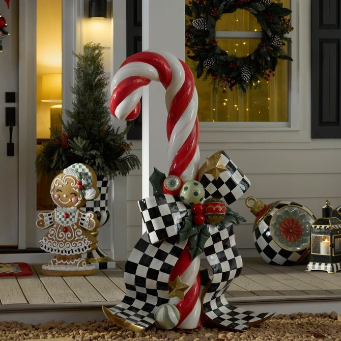 60-inch glossy resin trophy shaped like a red candy cane with white stripes.