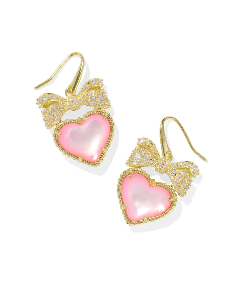 Gold drop earrings featuring a heart shape with a bedazzled bow on top.