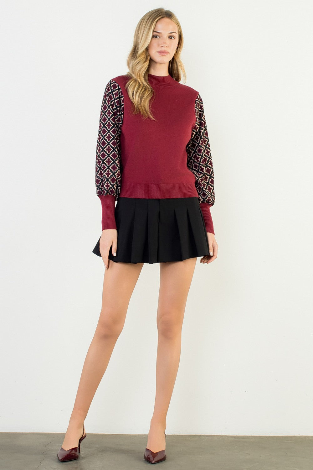 Hannah Mixed Media knit top in a soft neutral tone with a relaxed silhouette.