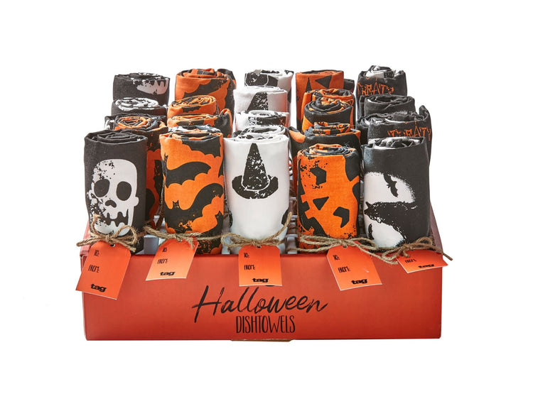 White cotton Halloween dishtowel with black jack-o'-lantern pattern