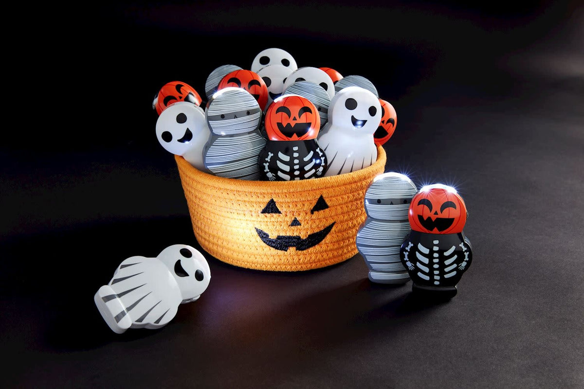 Black plastic Halloween musical flashlight with character silhouette playing spooky sounds.