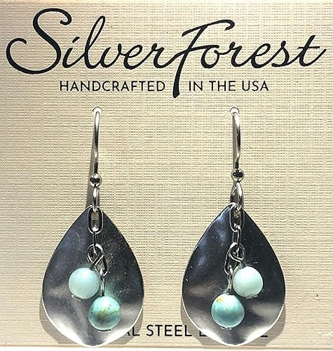 Handcrafted hammered tear drop earrings with turquoise beads on surgical steel fish hook backs.