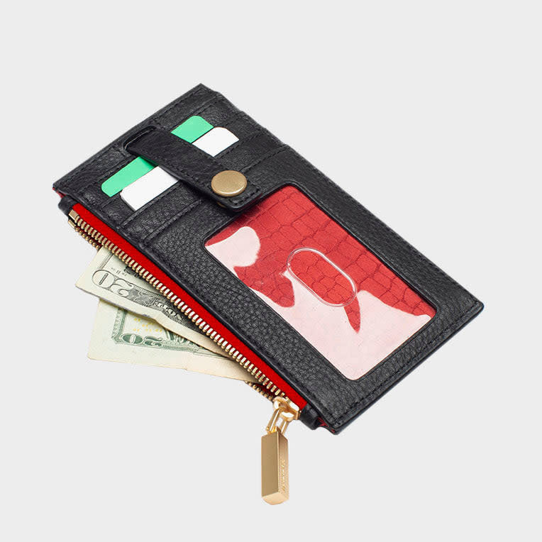Black leather zip wallet with snap closure showing card slots