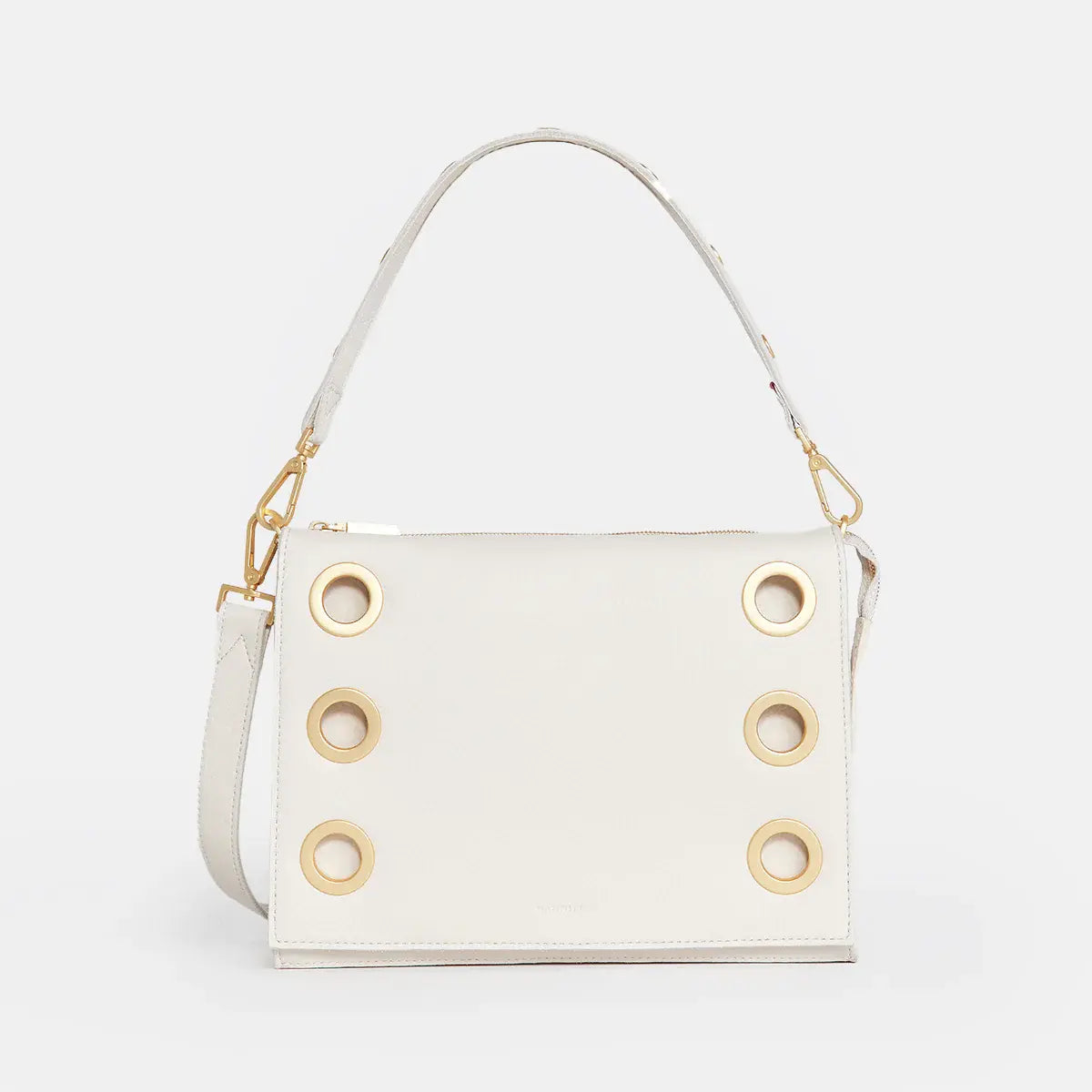 White Montana Clutch with vintage Hammitt strap, red base reveal, magnetic closure, and adjustable crossbody straps.