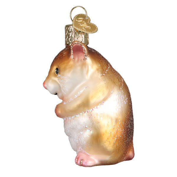 Side view of a brown hamster ornament figurine with textured fur.