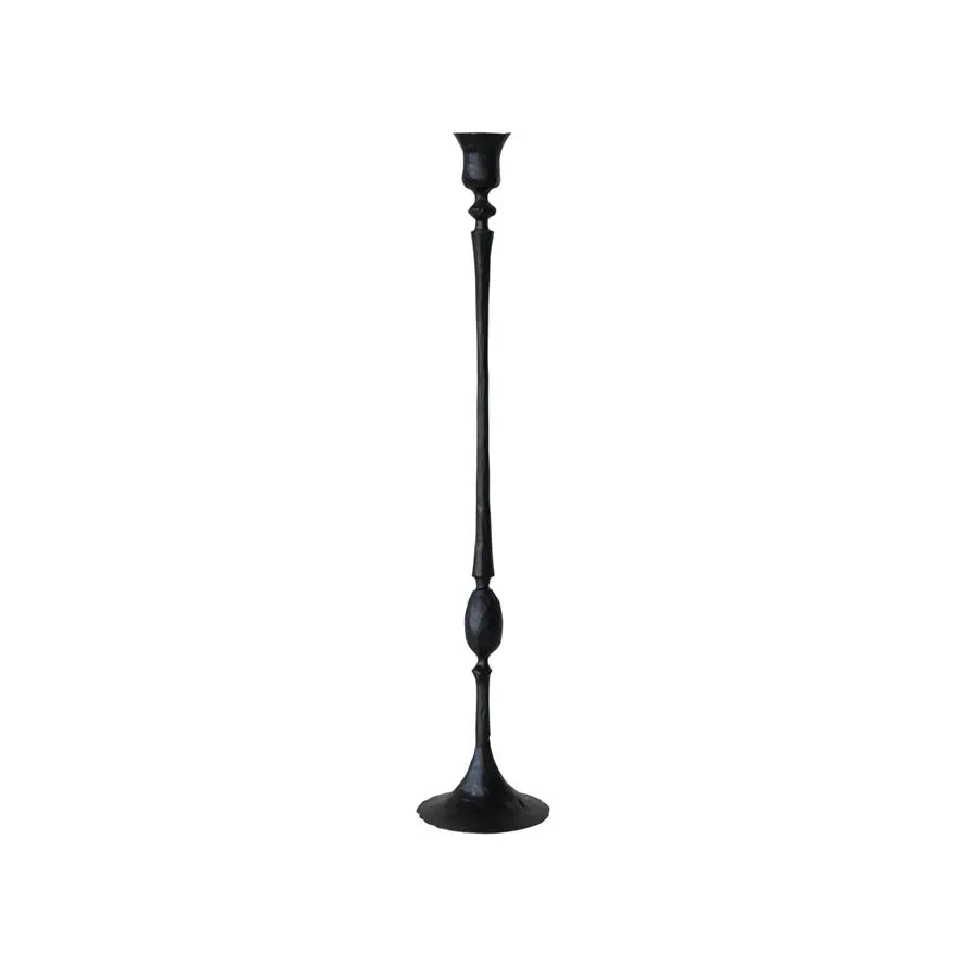 Hand-forged black cast iron taper holder with rustic hammered texture