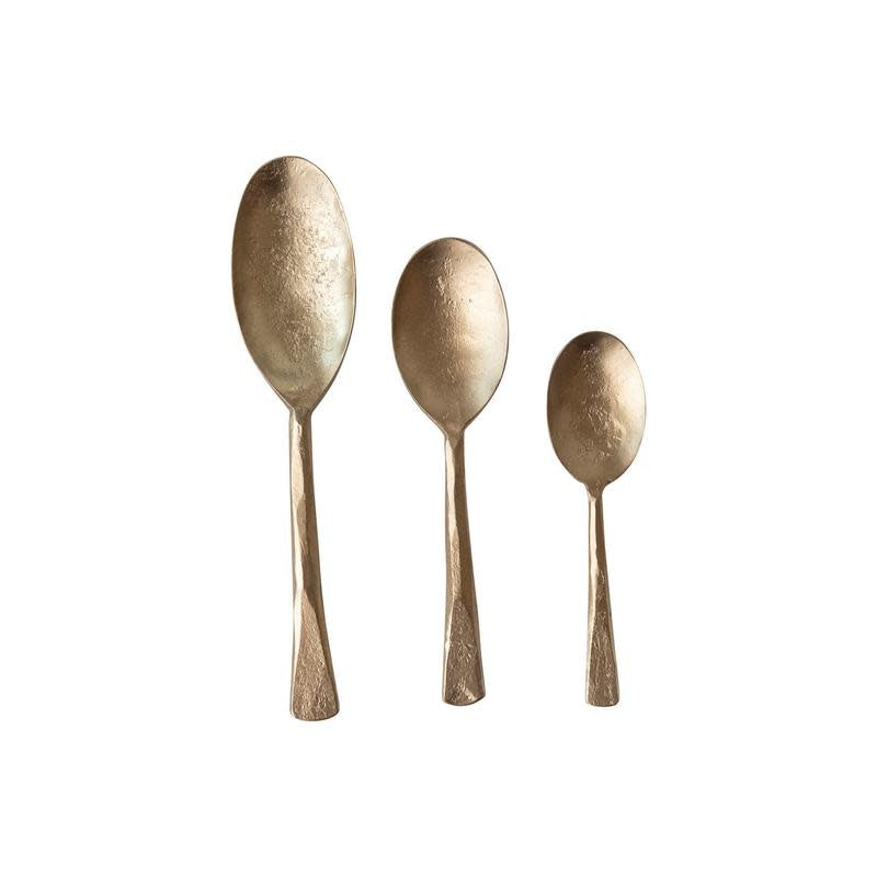 Set of three hand-forged iron spoons with antique gold finish in a printed drawstring bag.