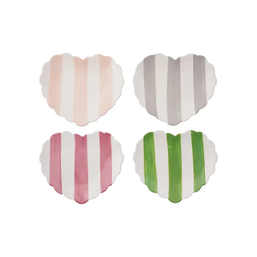 Hand-painted stoneware heart-shaped dish with striped pattern in neutral tones