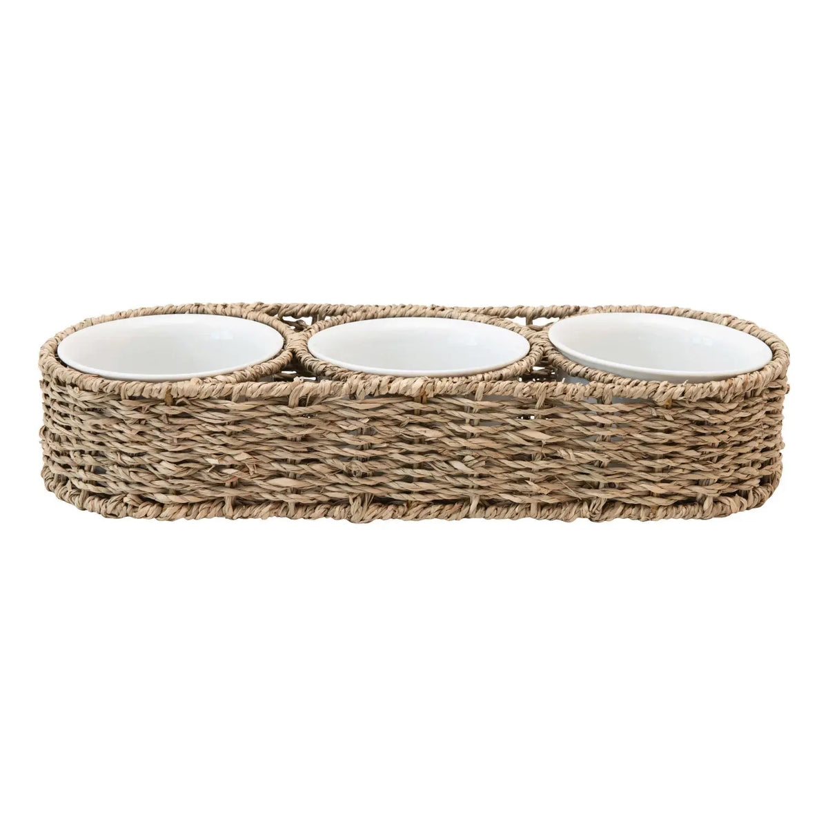 Hand-woven seagrass basket holding three ceramic bowls with dips