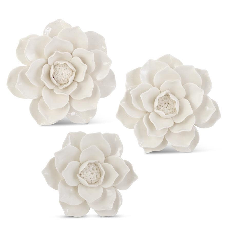 Handcrafted glossy white ceramic flower wall hanging with sleek modern silhouette