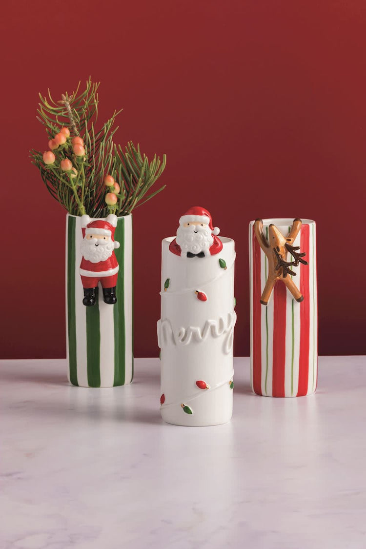 Hand-painted stoneware Bud Vase with hanging Santa attachment in festive holiday colors.