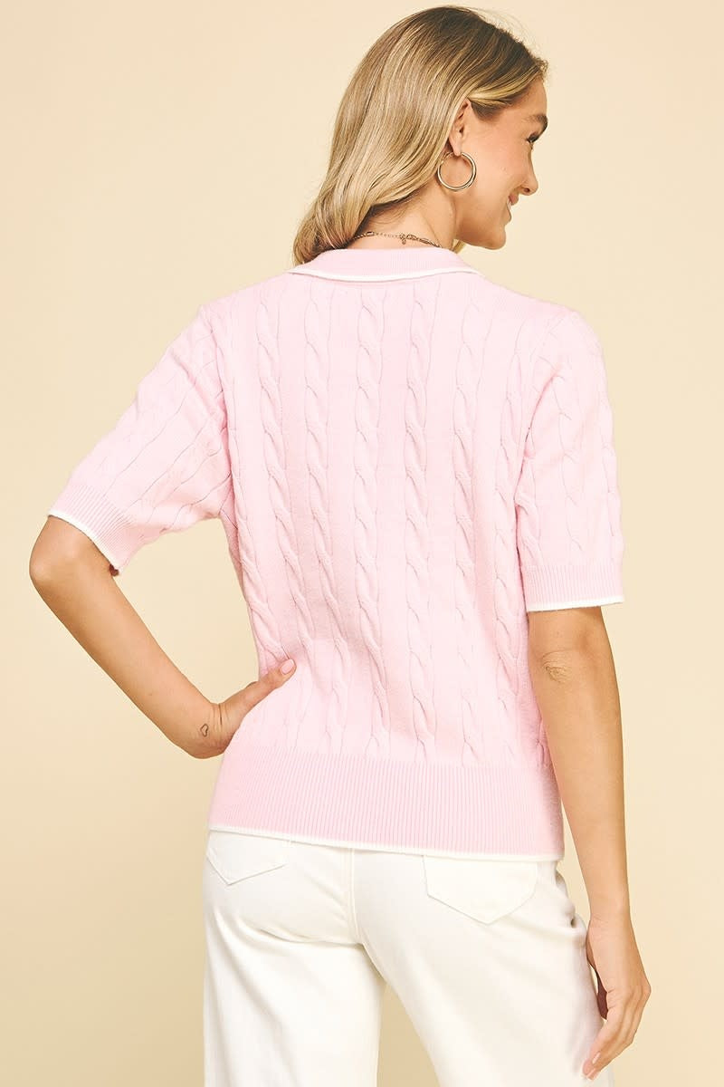 Back view of Hannah cable knit sweater in acrylic fabric with short sleeves.