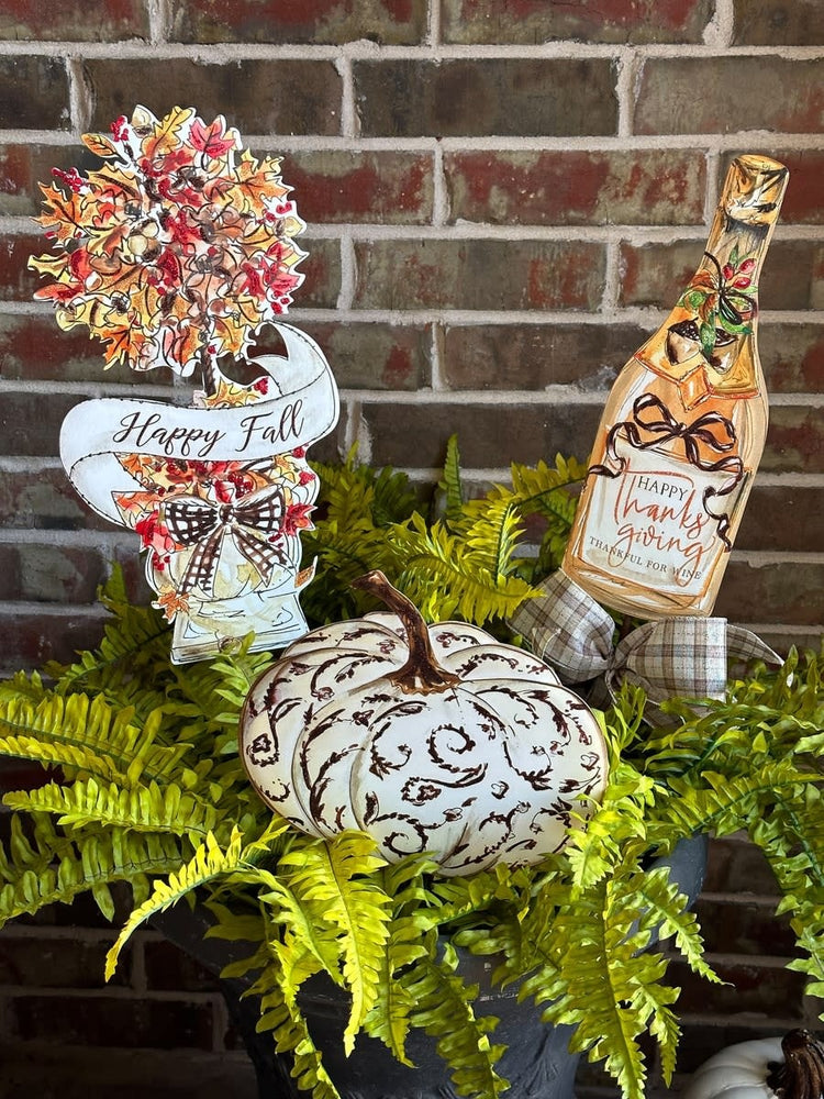 Happy Fall Tree decorative stake with autumn leaves in warm orange and brown tones on a natural wood finish.