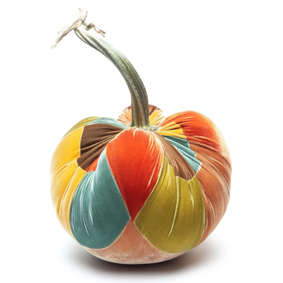 Handmade patchwork velvet pumpkin in orange with a natural stem.