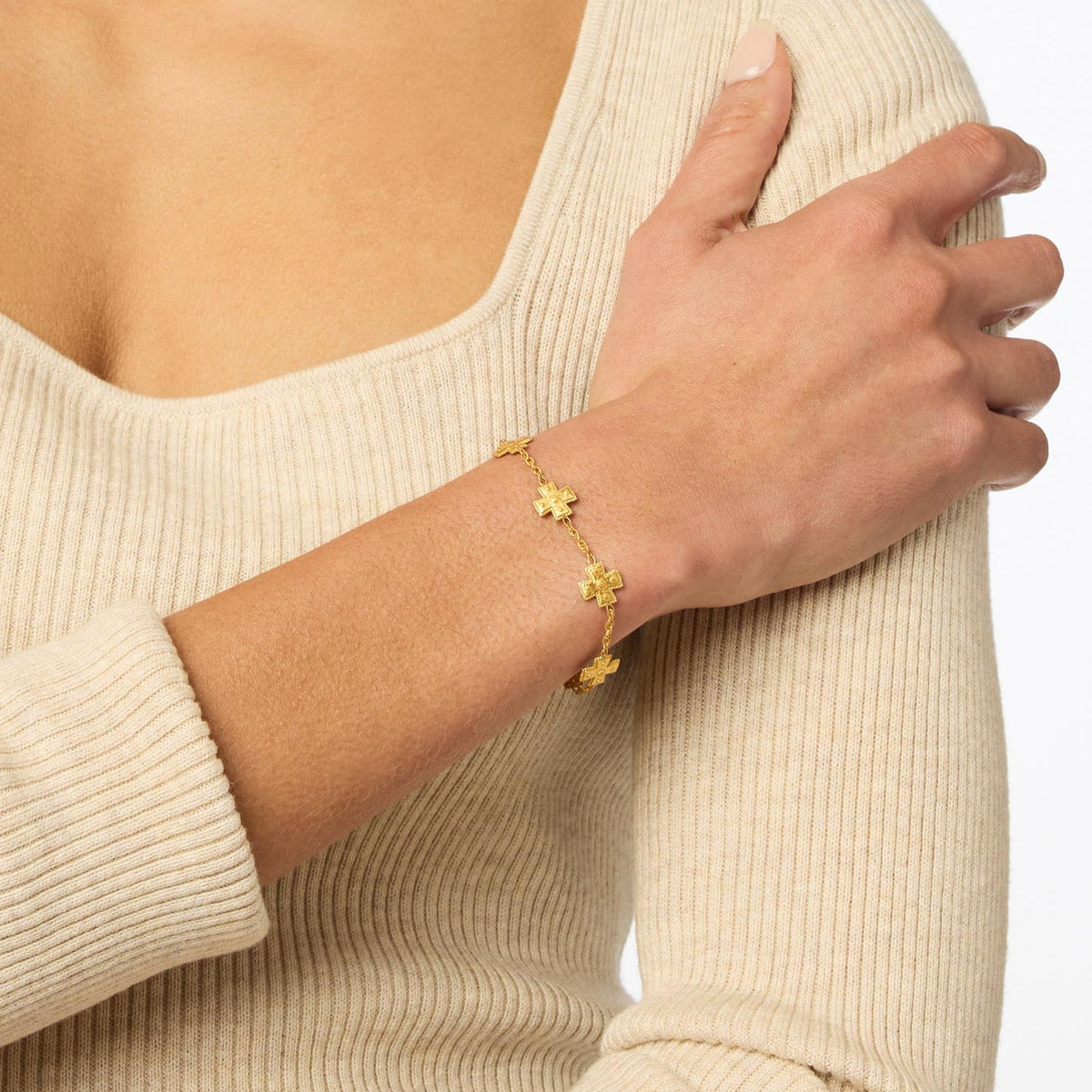 Adjustable gold-plated delicate bracelet with lobster clasp closure.