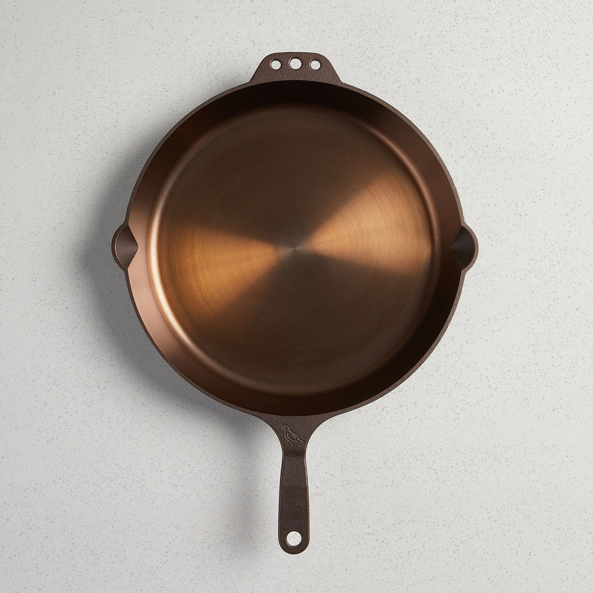 Top-down view of a No. 14 Traditional Skillet with a polished finish, pour spouts, and long handle.