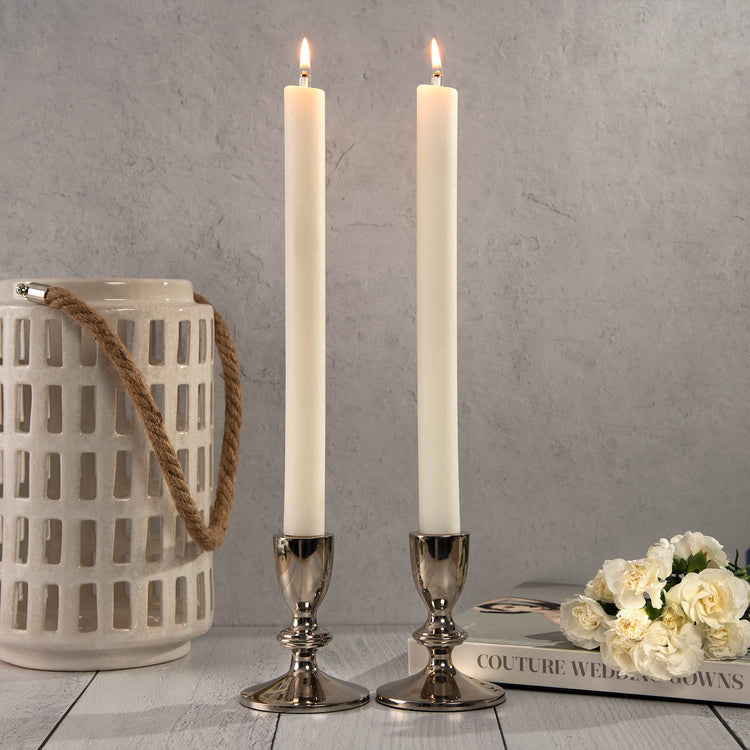 Natural white cylindrical dinner candle with a universal adapter in Lucid gift box packaging.